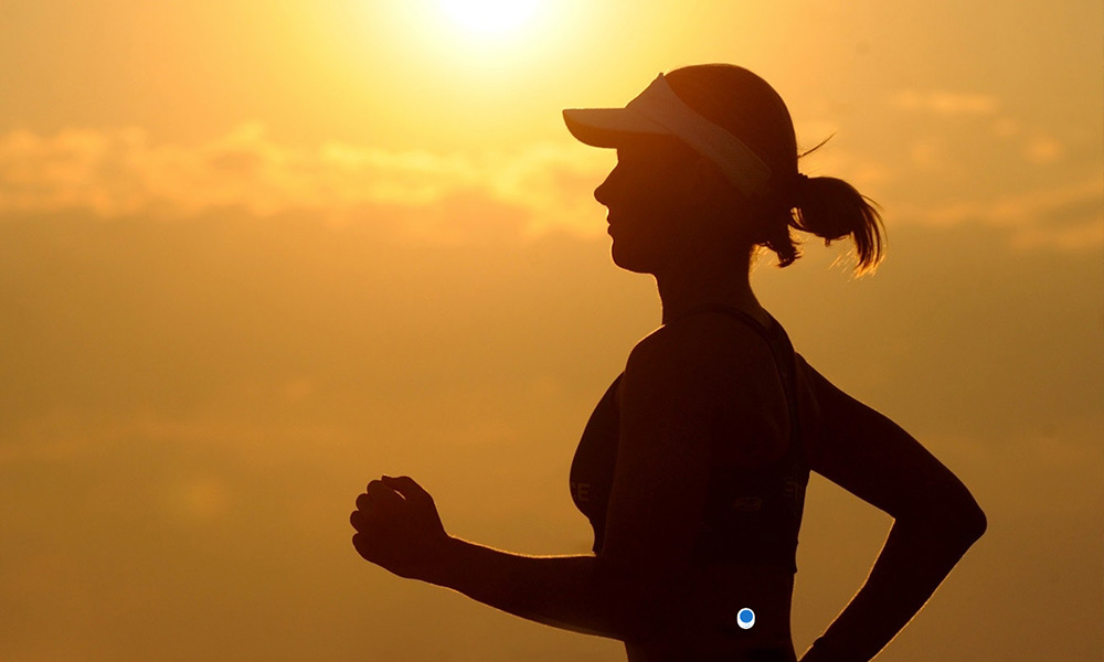 woman-running-at-sunset